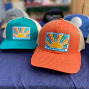 Live the Life you Love Retro Sun trucker hat in pumpkin or jade
